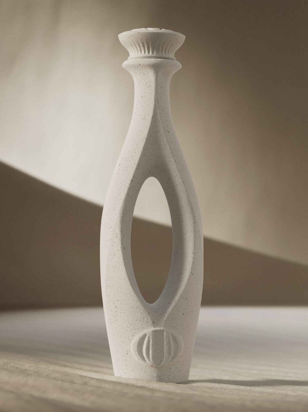 White ceramic vase with abstract design and elongated neck, set against a neutral background